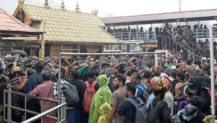 കനത്ത മഴയിലും ശബരിമലയിലേക്ക്‌ തീർഥാടക പ്രവാഹം ; നിരോധനത്തിൽ ഇളവ്‌